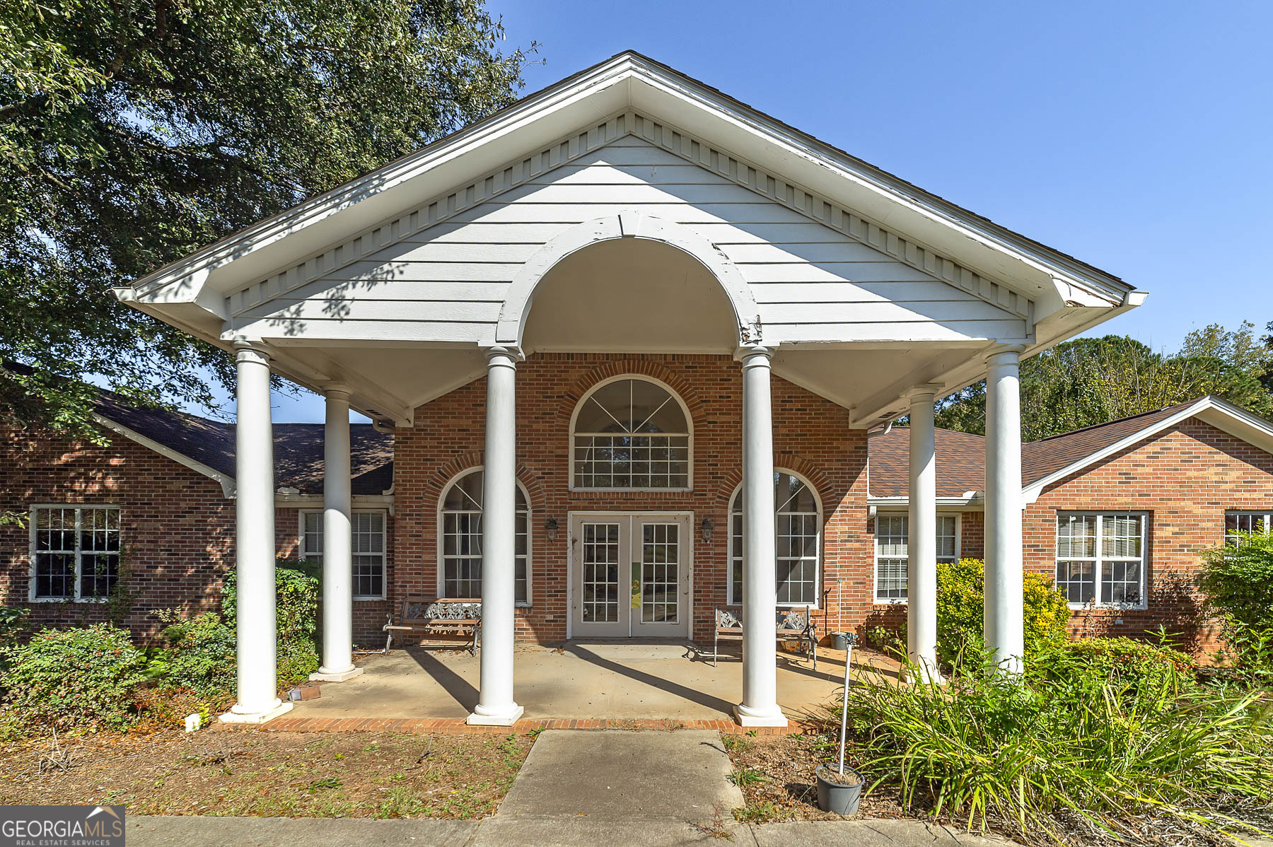 a view of a house with a porch