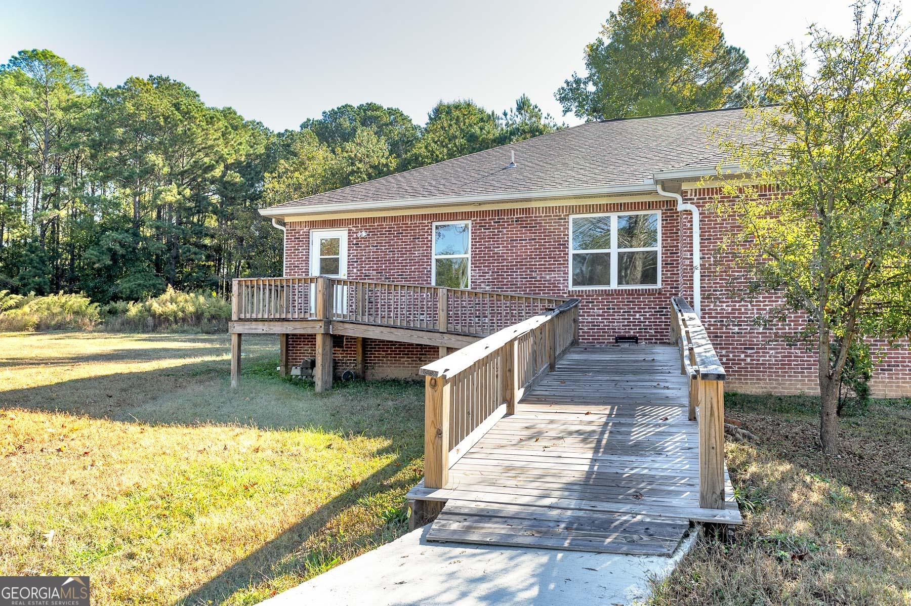 3084 Highway 81 Hampton, GA 30228 - Photo 14 of 57 a view of a house with backyard and sitting area