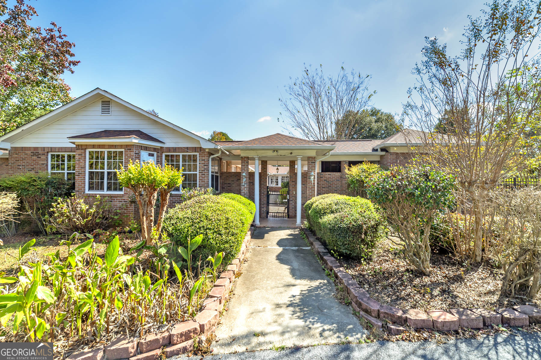 3084 Highway 81 Hampton, GA 30228 - Photo 16 of 57 a view of a patio with table and chairs and potted plants