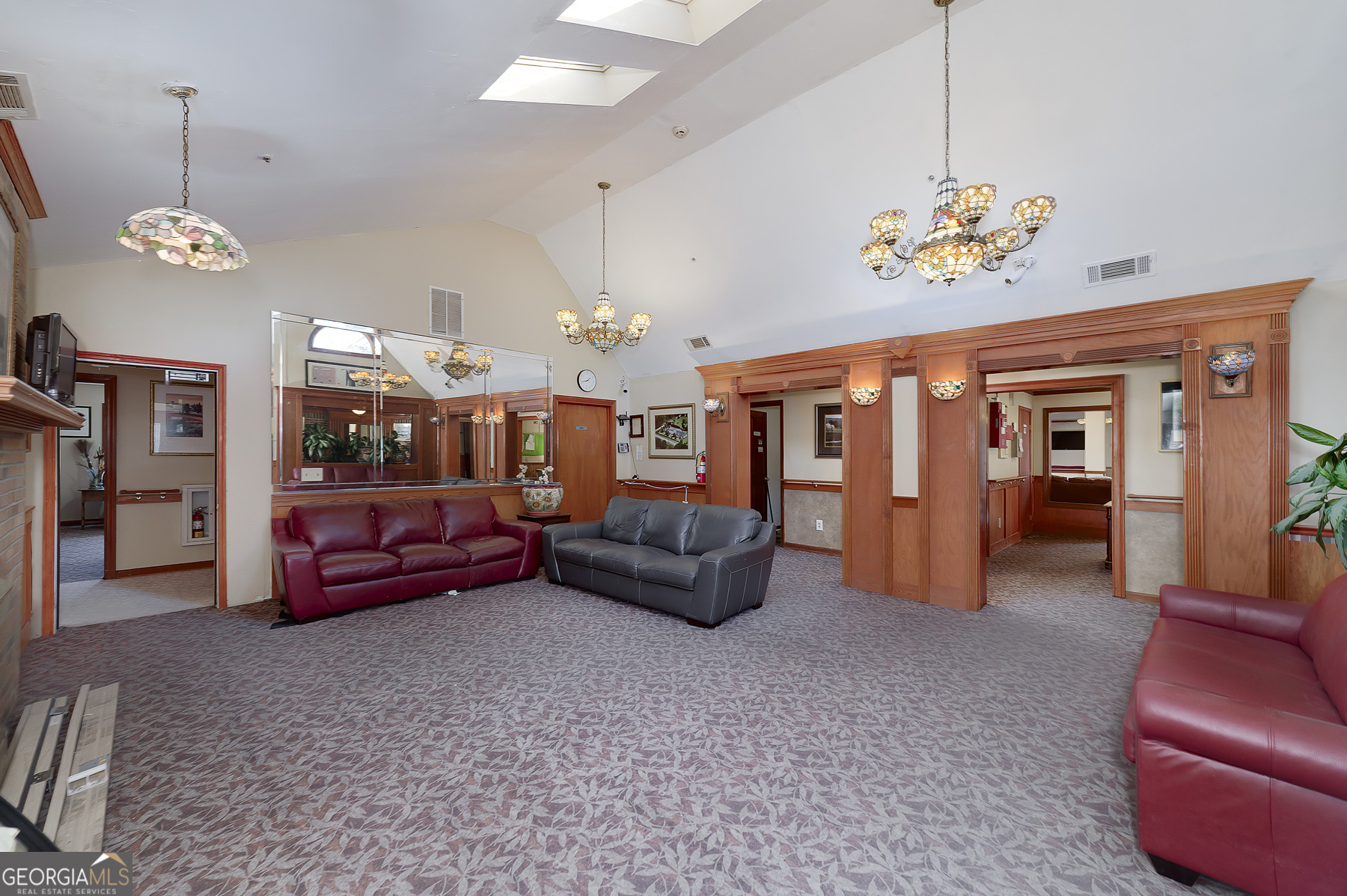 3084 Highway 81 Hampton, GA 30228 - Photo 23 of 57 a living room with furniture chandelier and a chandelier
