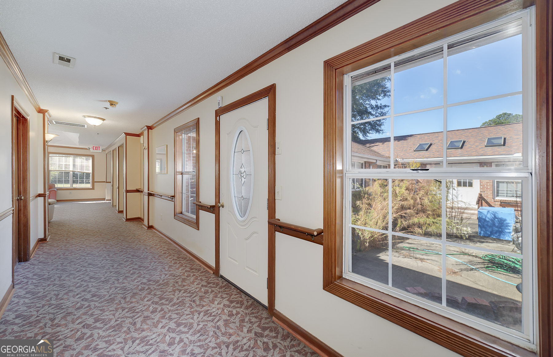 3084 Highway 81 Hampton, GA 30228 - Photo 33 of 57 a view of a hallway with wooden floor and door