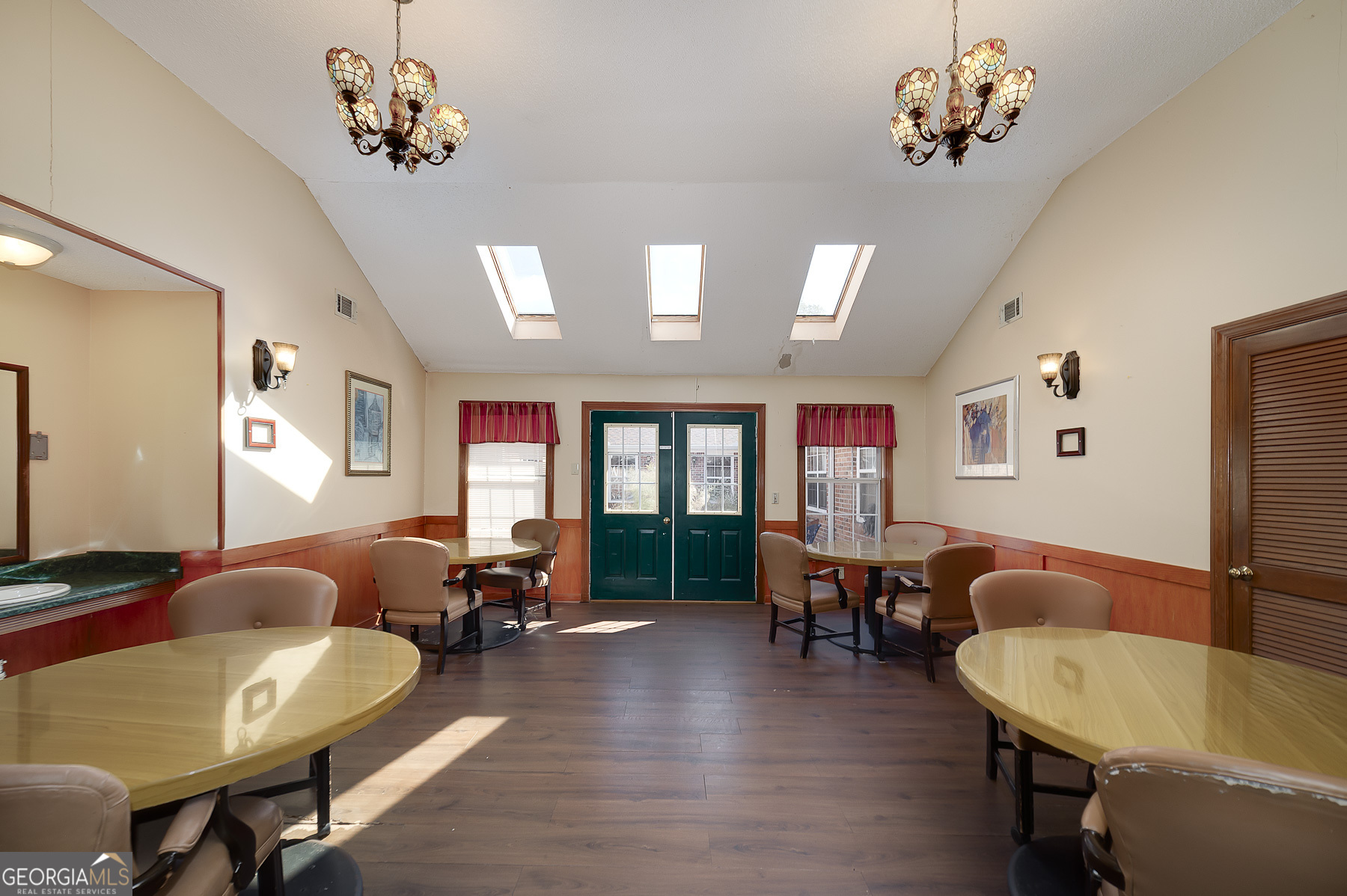3084 Highway 81 Hampton, GA 30228 - Photo 38 of 57 a living room with furniture two window and wooden floor