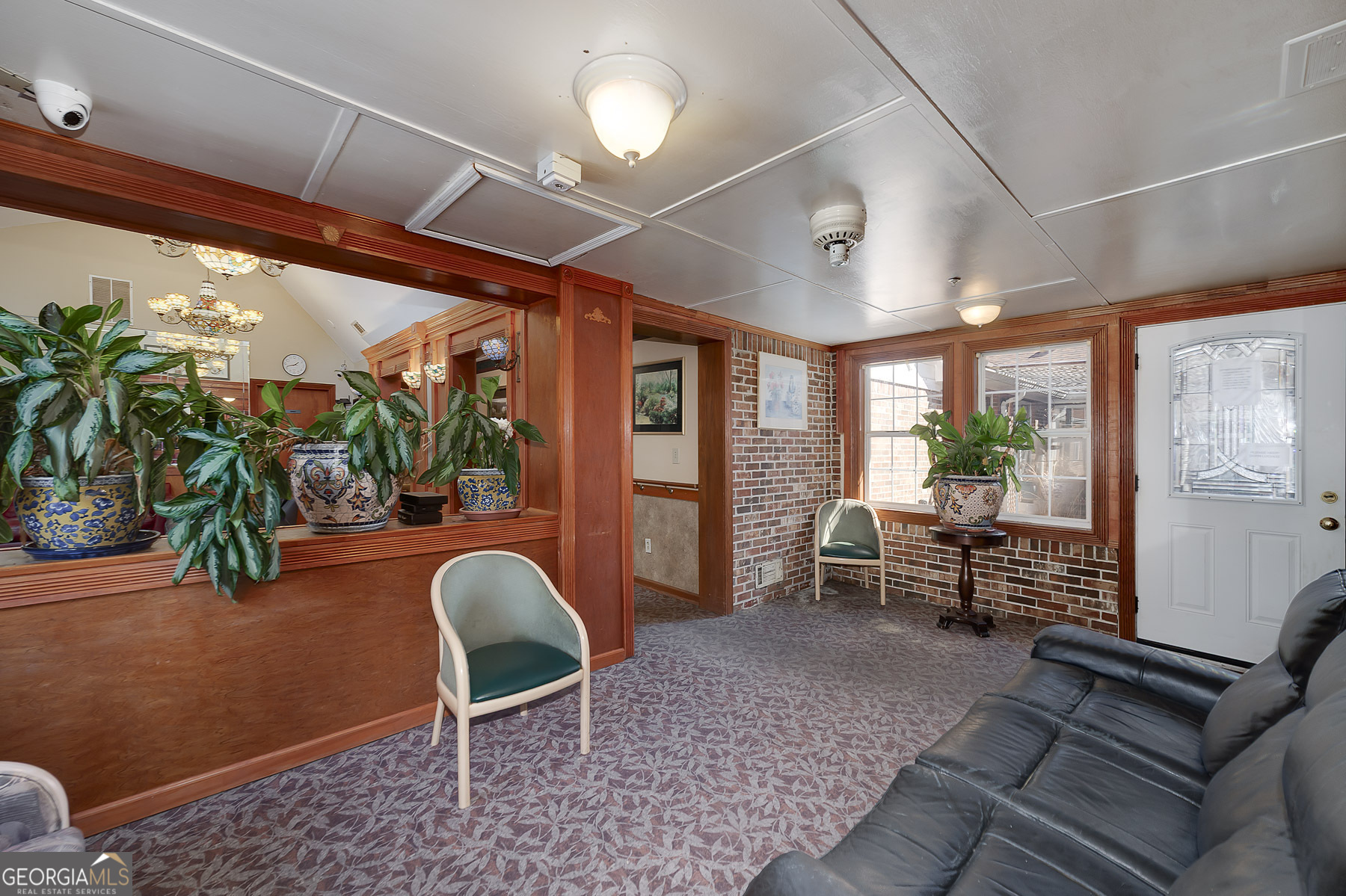 3084 Highway 81 Hampton, GA 30228 - Photo 43 of 57 a living room with patio furniture and a large window