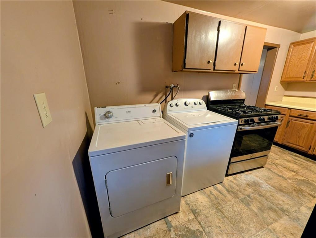 407 Mitchell Avenue Butler, PA 16001 - Photo 13 of 19 a utility room with dryer and washer