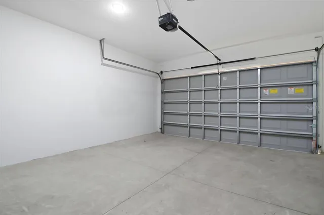 a house with swimming pool in front of it