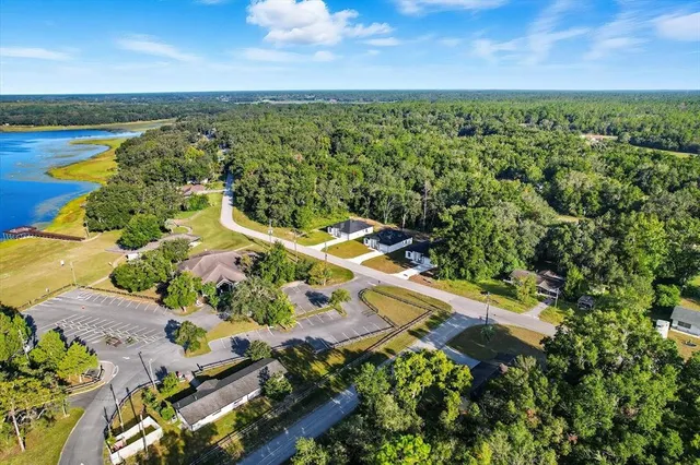an aerial view of a house with a garden