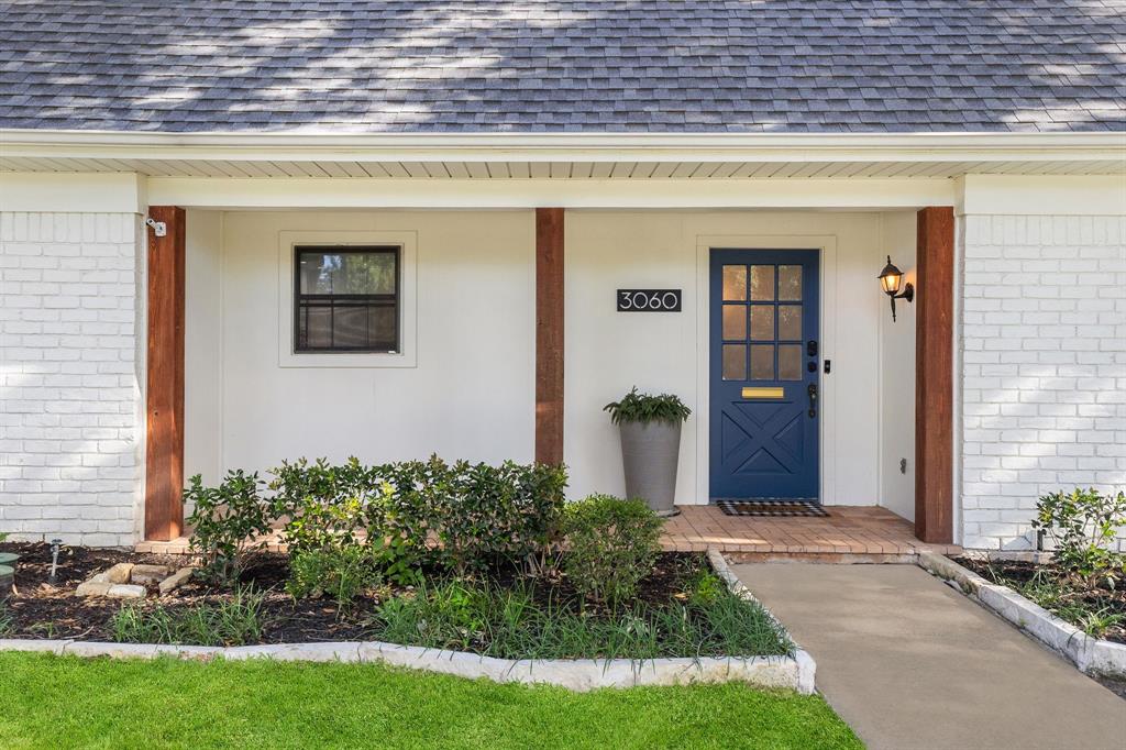 3060 Timberview Road Dallas, TX 75229 - Photo 3 of 39 White painted brick facade with a charcoal shingle roof