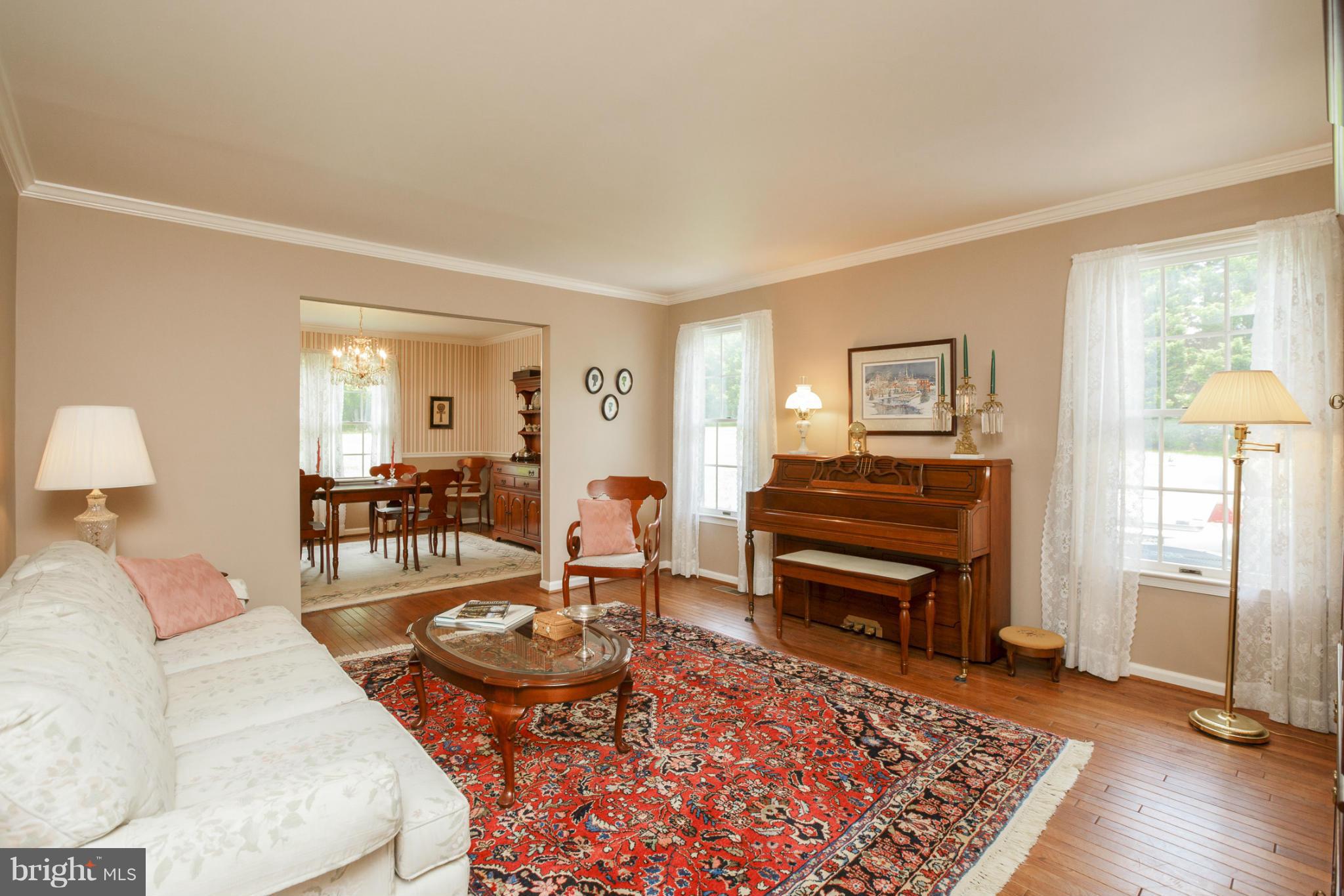 7246 Bowers Road Frederick, MD 21702 - Photo 11 of 30 a living room with furniture and wooden floor