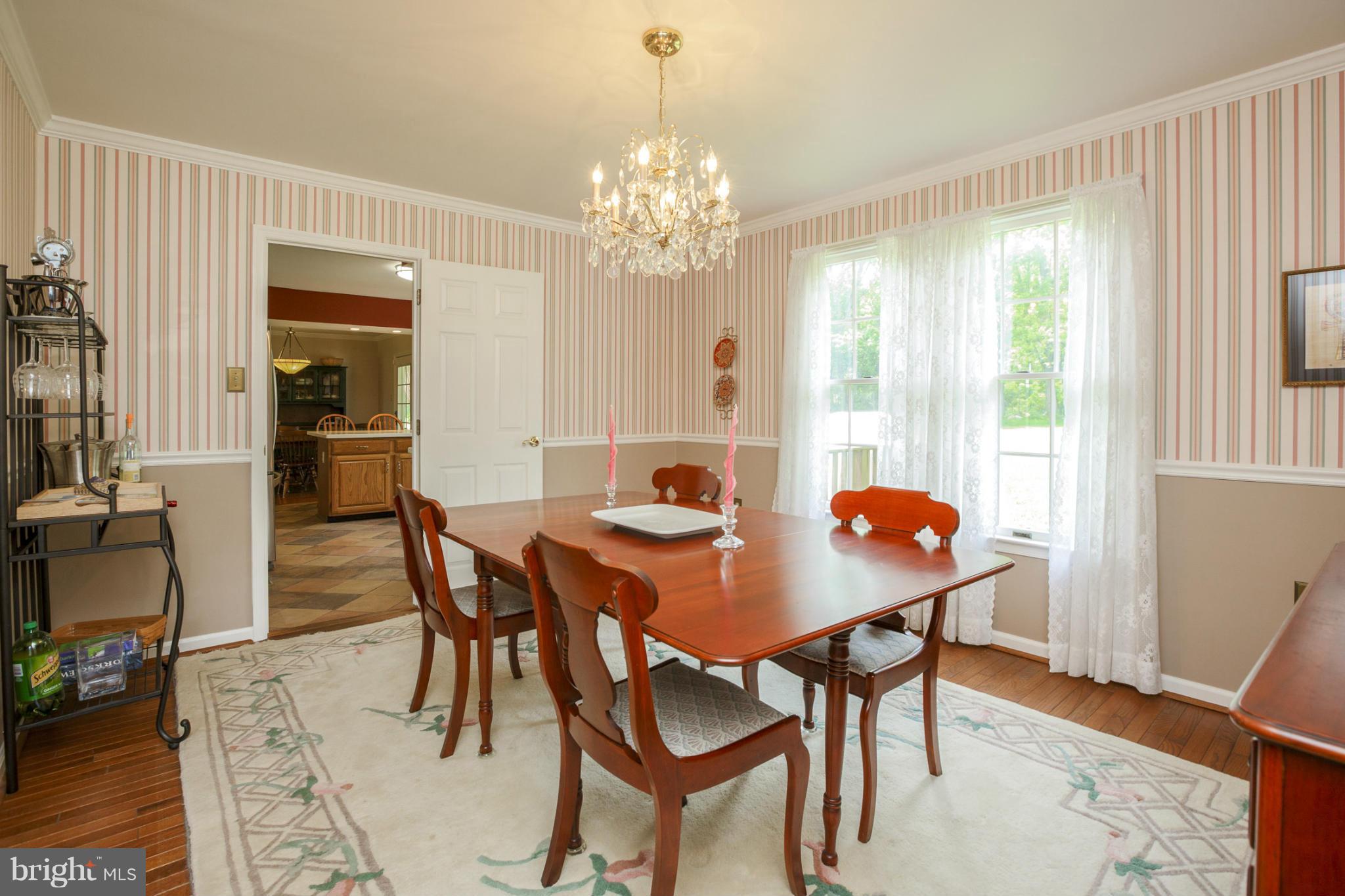 7246 Bowers Road Frederick, MD 21702 - Photo 12 of 30 a view of a dining room with furniture and window