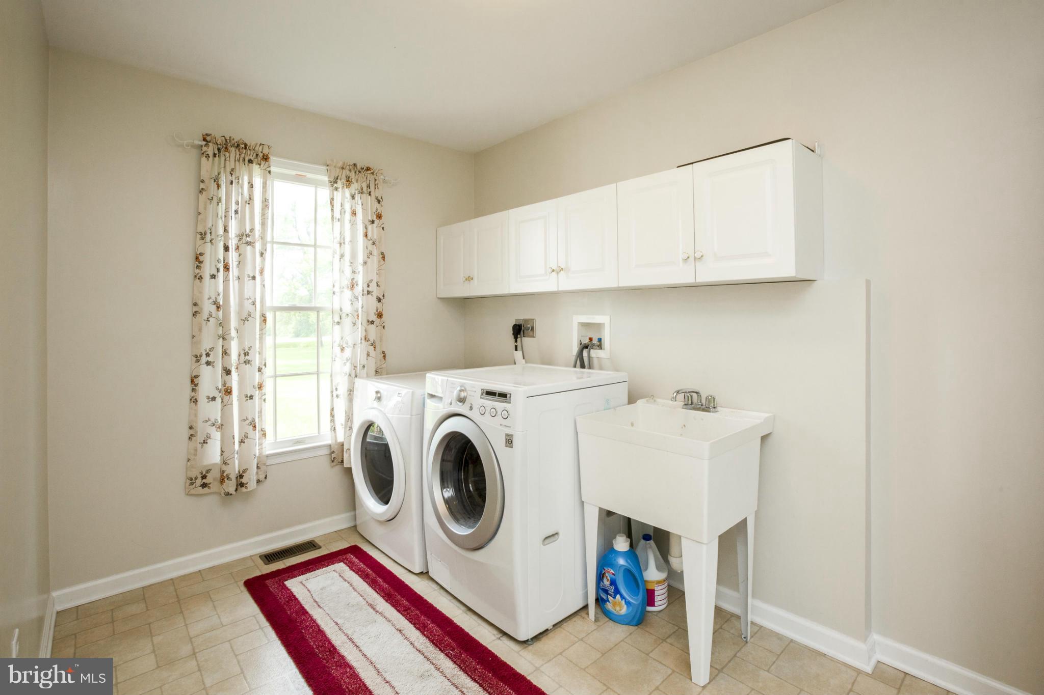 7246 Bowers Road Frederick, MD 21702 - Photo 21 of 30 a utility room with dryer and washer