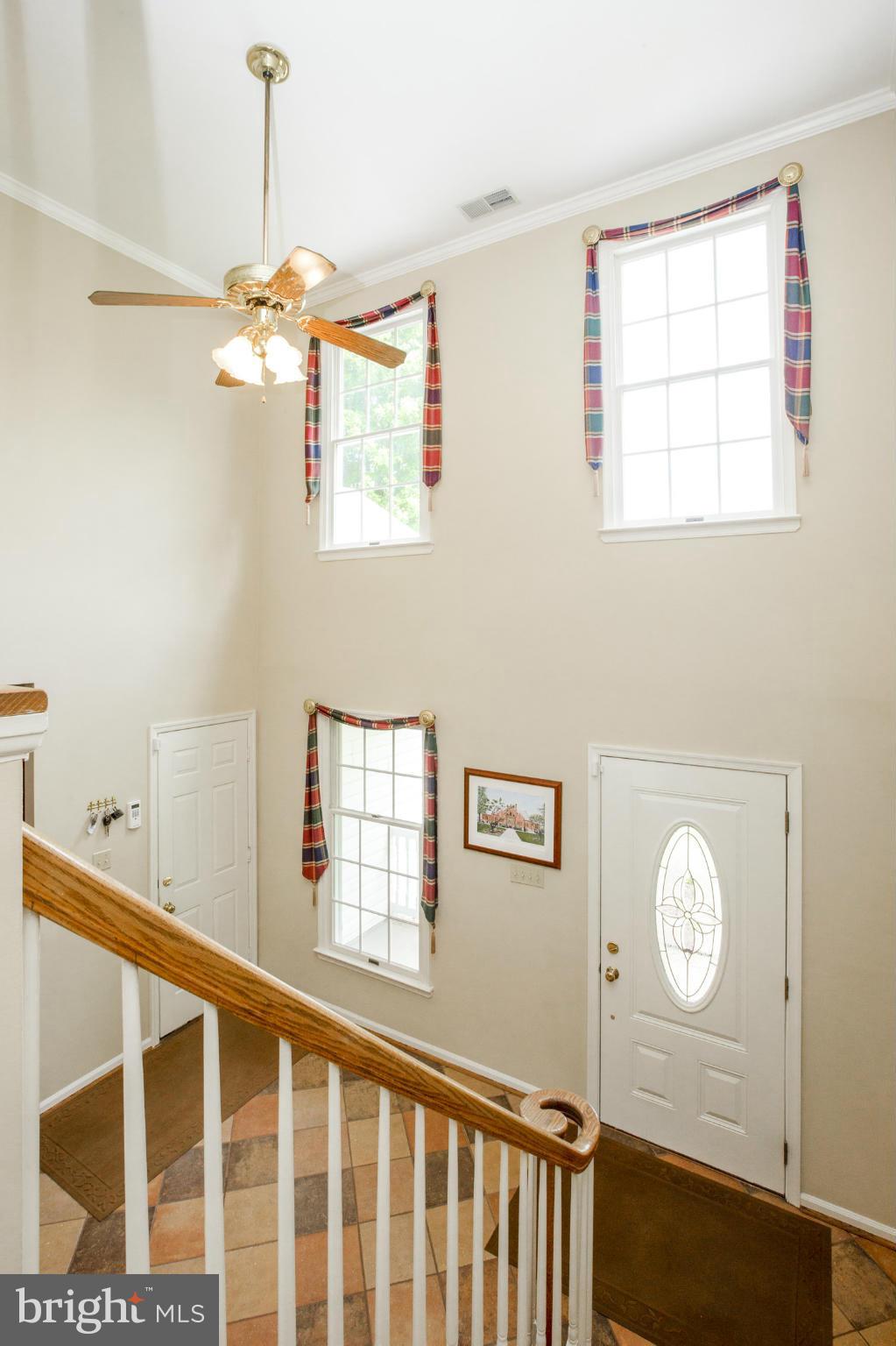 7246 Bowers Road Frederick, MD 21702 - Photo 22 of 30 a view of a hallway with windows