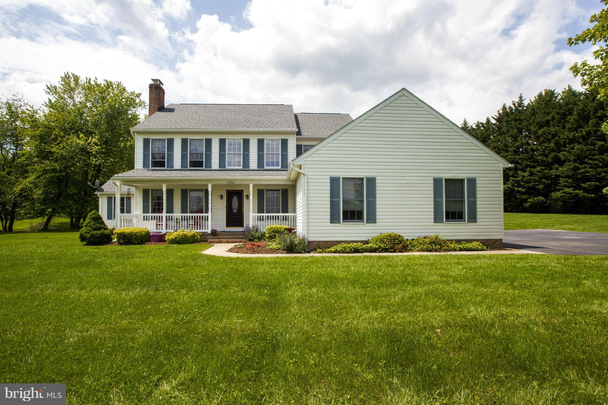 7246 Bowers Road Frederick, MD 21702 - Photo 30 of 30 a front view of a house with a garden