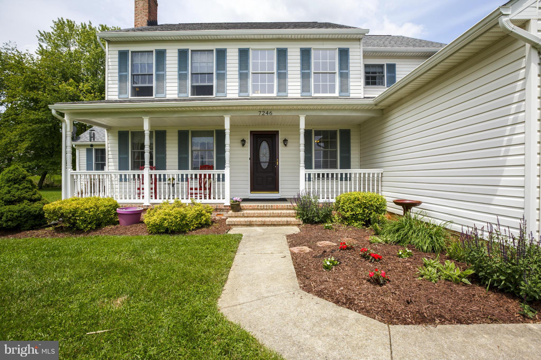 7246 Bowers Road Frederick, MD 21702 - Photo 9 of 30 a front view of a house with garden