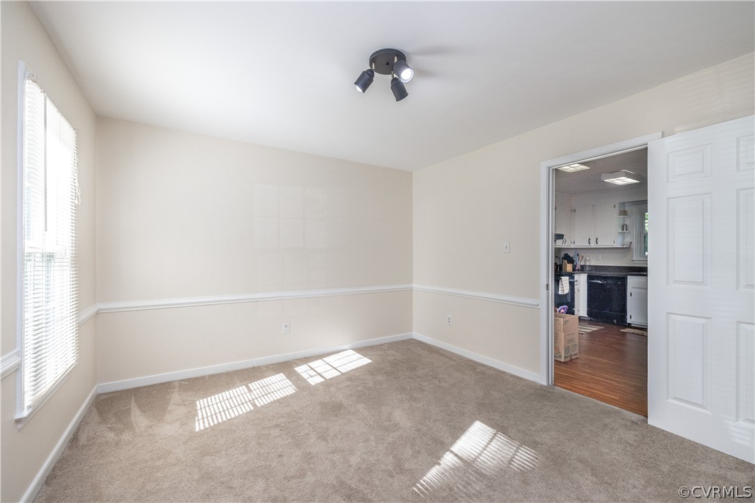 7436 Drexelbrook Road Chesterfield, VA 23832 - Photo 13 of 31 wooden floor in an empty room with a window