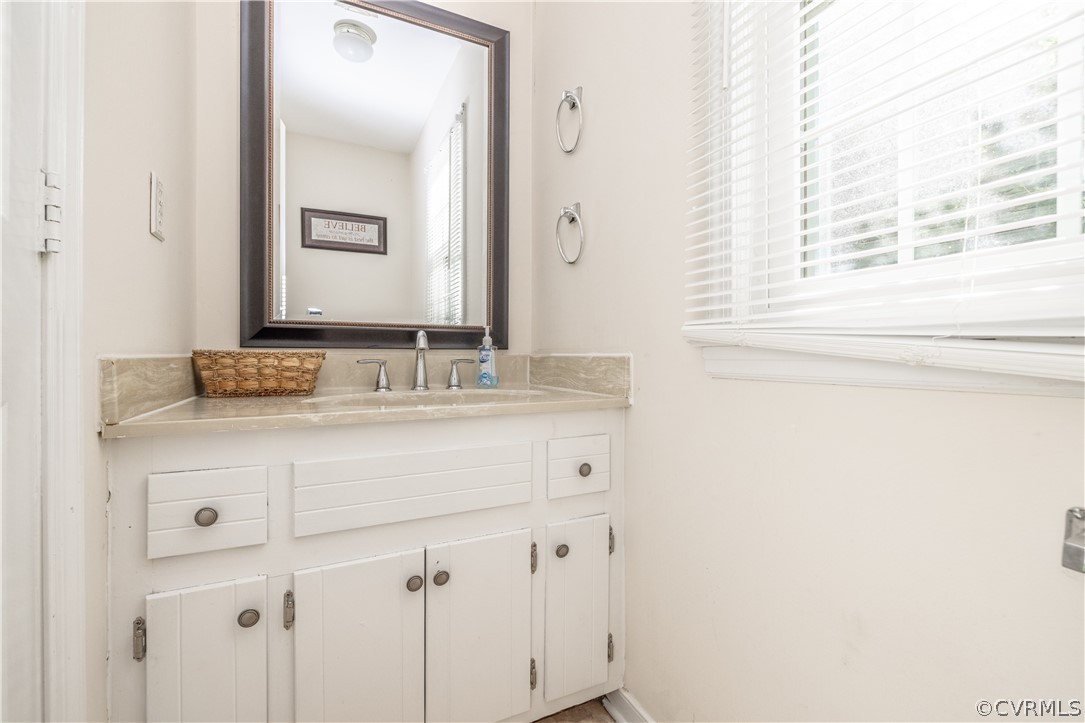 7436 Drexelbrook Road Chesterfield, VA 23832 - Photo 15 of 31 a bathroom with a sink and a mirror