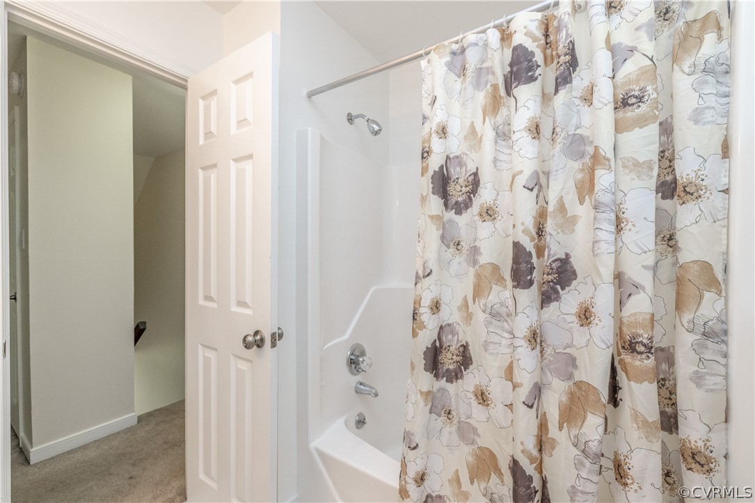 7436 Drexelbrook Road Chesterfield, VA 23832 - Photo 22 of 31 a bathroom with a shower curtain and a shower curtain