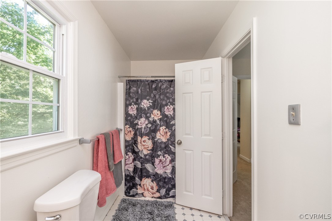 7436 Drexelbrook Road Chesterfield, VA 23832 - Photo 27 of 31 a bathroom with a toilet sink and shower