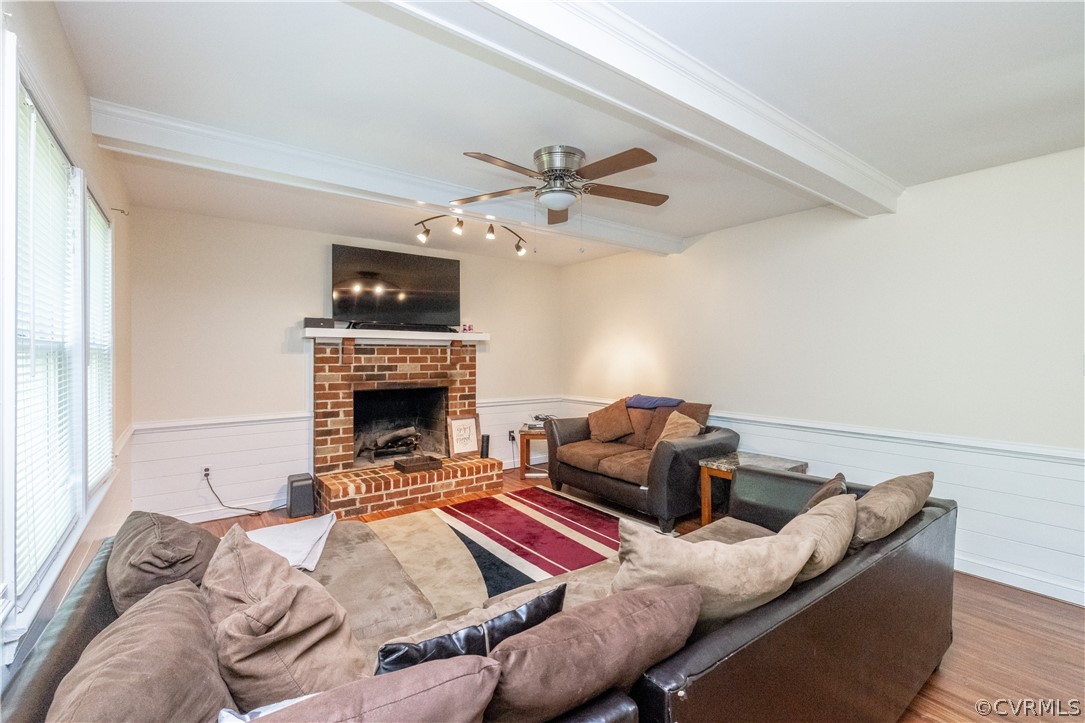 7436 Drexelbrook Road Chesterfield, VA 23832 - Photo 8 of 31 a living room with furniture and a fireplace