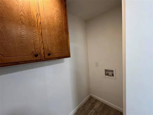 a bathroom with a sink vanity and a mirror