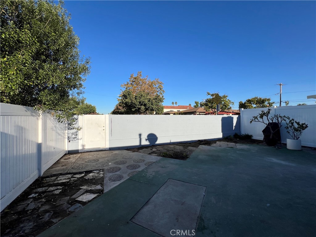 1741 Tustin Avenue, Unit 10C Costa Mesa, CA 92627 - Photo 12 of 21 PRIVATE GATE ACCESS ON LEFT