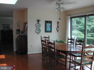 310 High Ridge Road Greenville, DE 19807 - Photo 5 of 6 a view of a dining room with furniture window and outside view