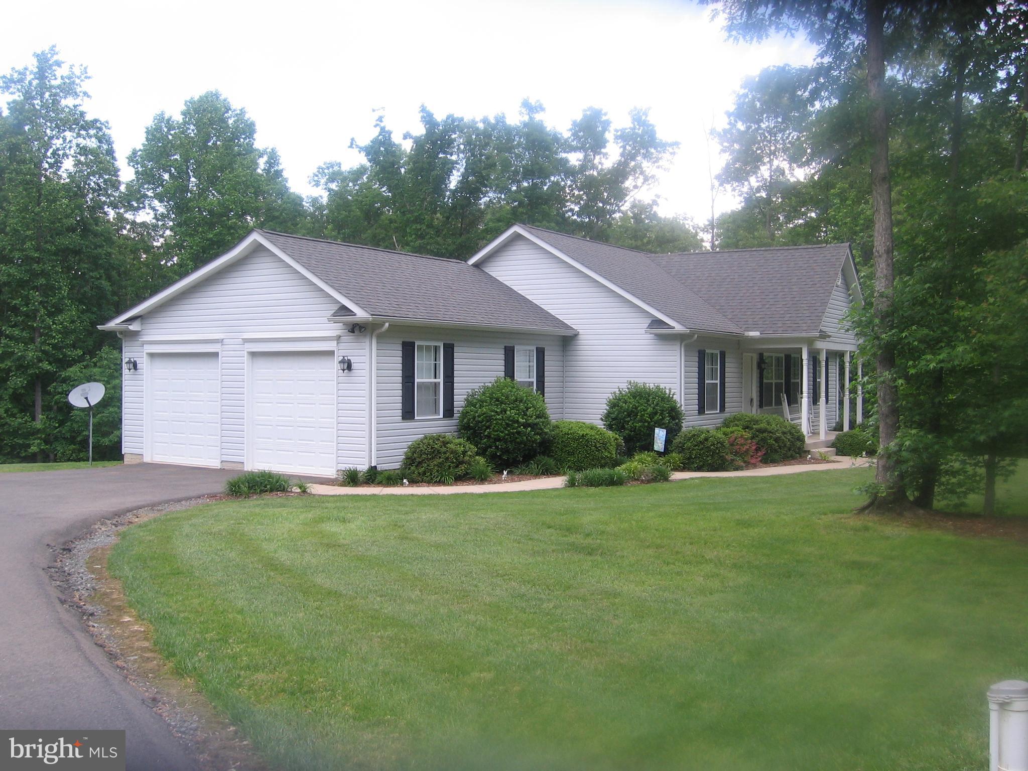 13603 Round Hill Road King George, VA 22485 - Photo 2 of 13 Two car garage with asphalt drive way