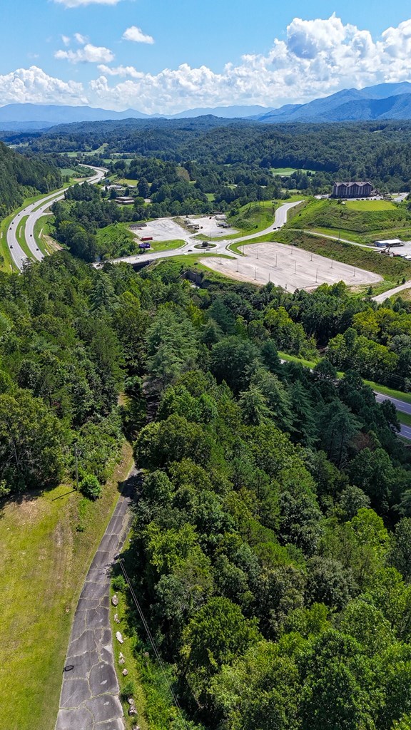 2201 Andrews Road Murphy, NC 28906 - Photo 7 of 11 a view of a lake with a mountain in the background