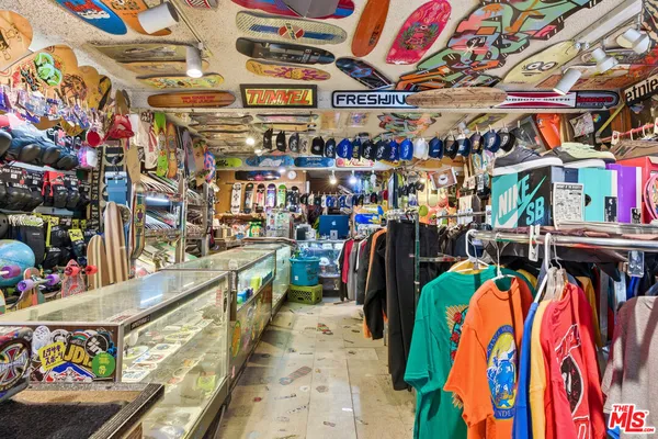 a view of kitchen with sink oven and window