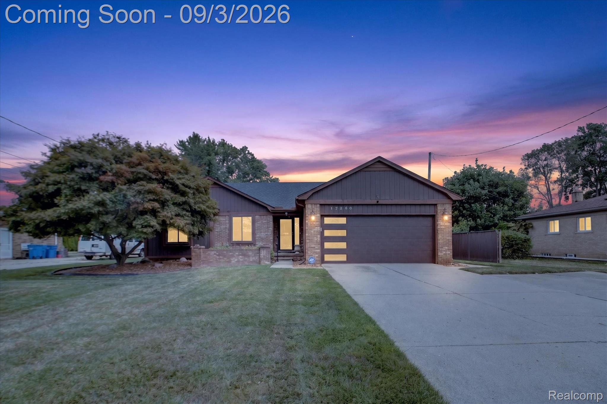 27260 Campbell Road Warren, MI 48093 - Photo 1 of 60 Brick and siding exterior featuring a prominent two-car garage with horizontal panel windows
