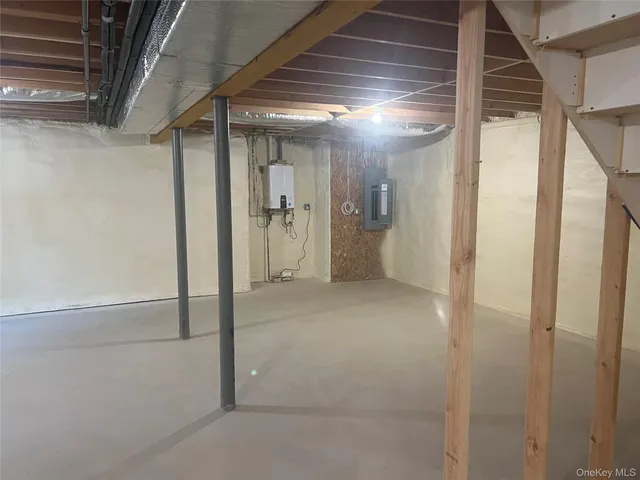 a view of an empty room with stairs