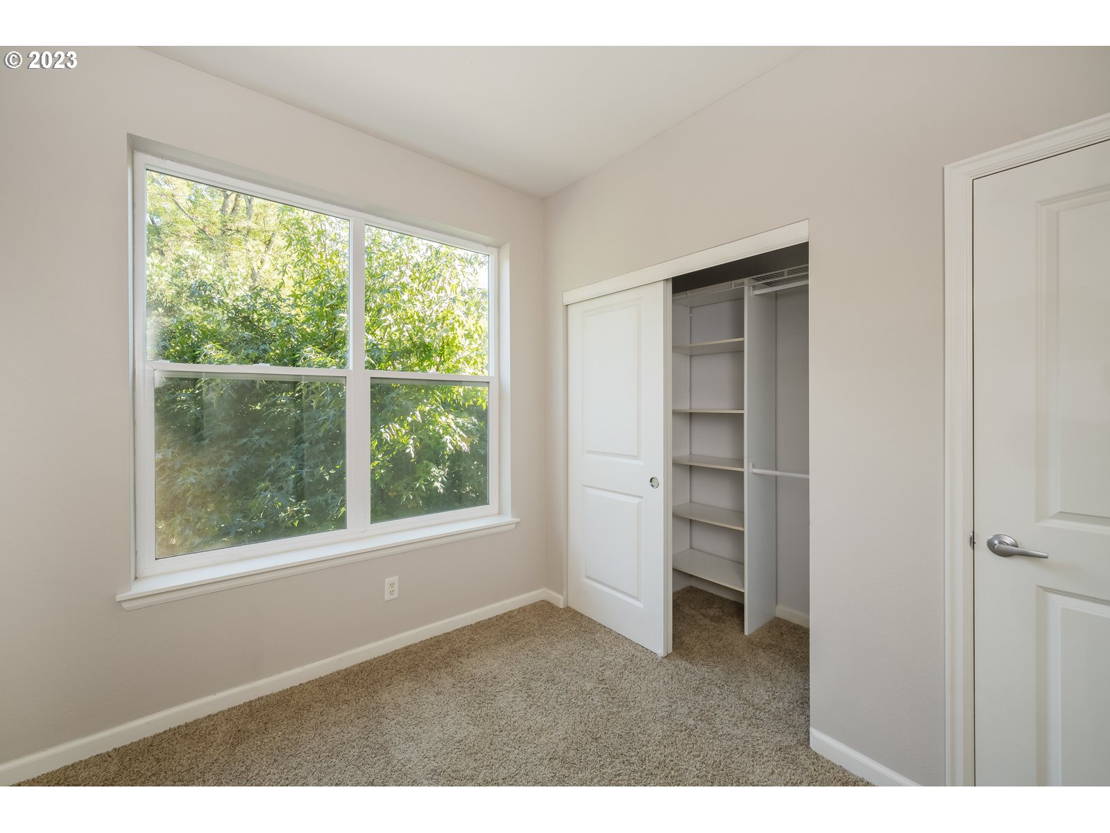 8712 North Decatur Street, Unit 201 Portland, OR 97203 - Photo 18 of 40 a room with closet and windows