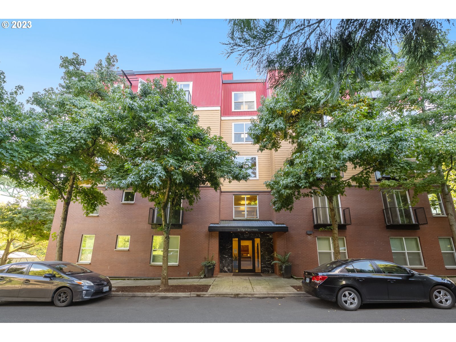8712 North Decatur Street, Unit 201 Portland, OR 97203 - Photo 3 of 40 a car parked in front of a house