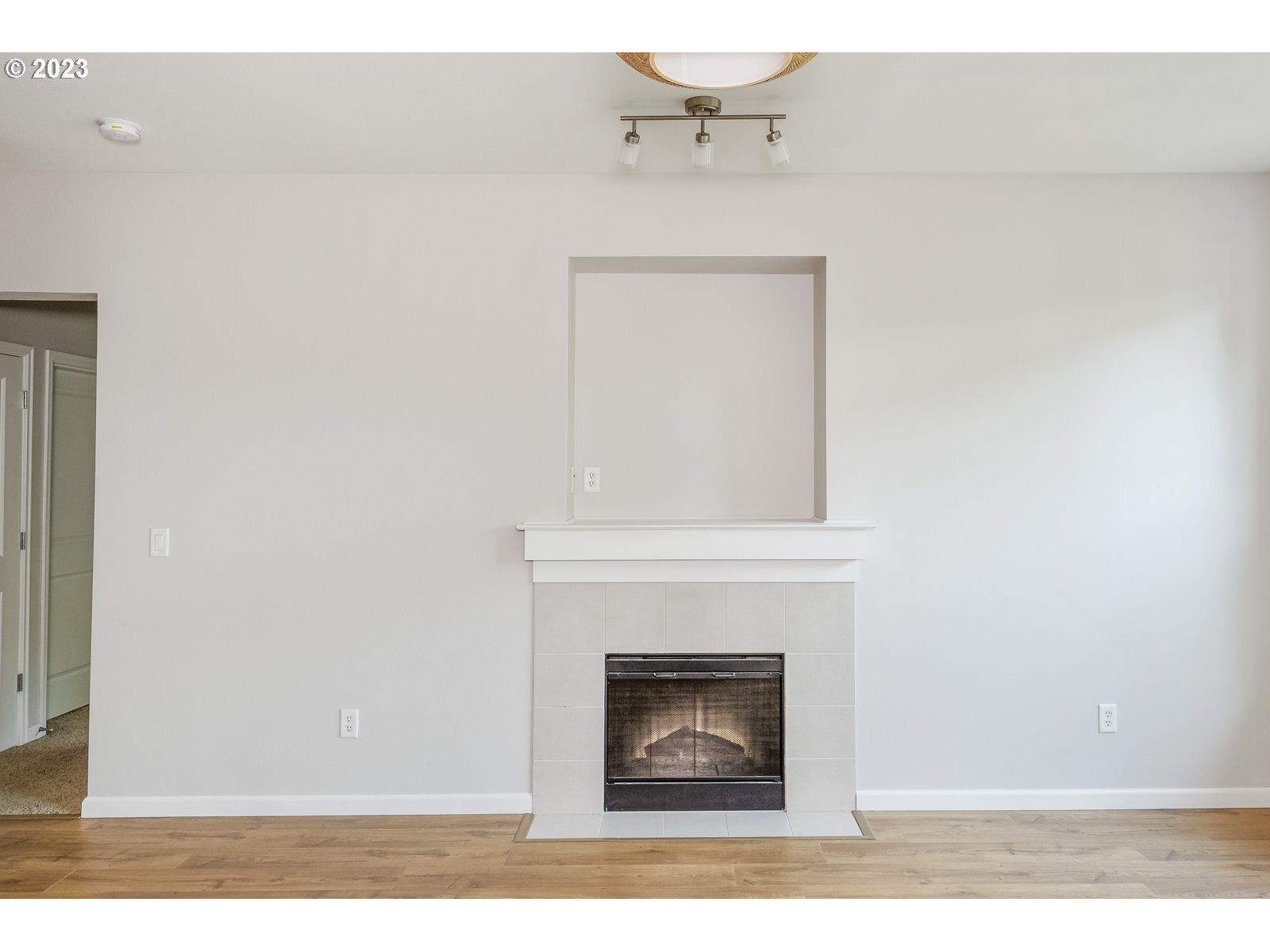 8712 North Decatur Street, Unit 201 Portland, OR 97203 - Photo 6 of 40 a view of a livingroom with a fireplace