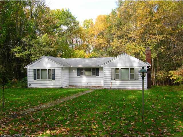 132 Ross Road Middlefield, CT 06481 - Photo 1 of 1 a front view of a house with a yard