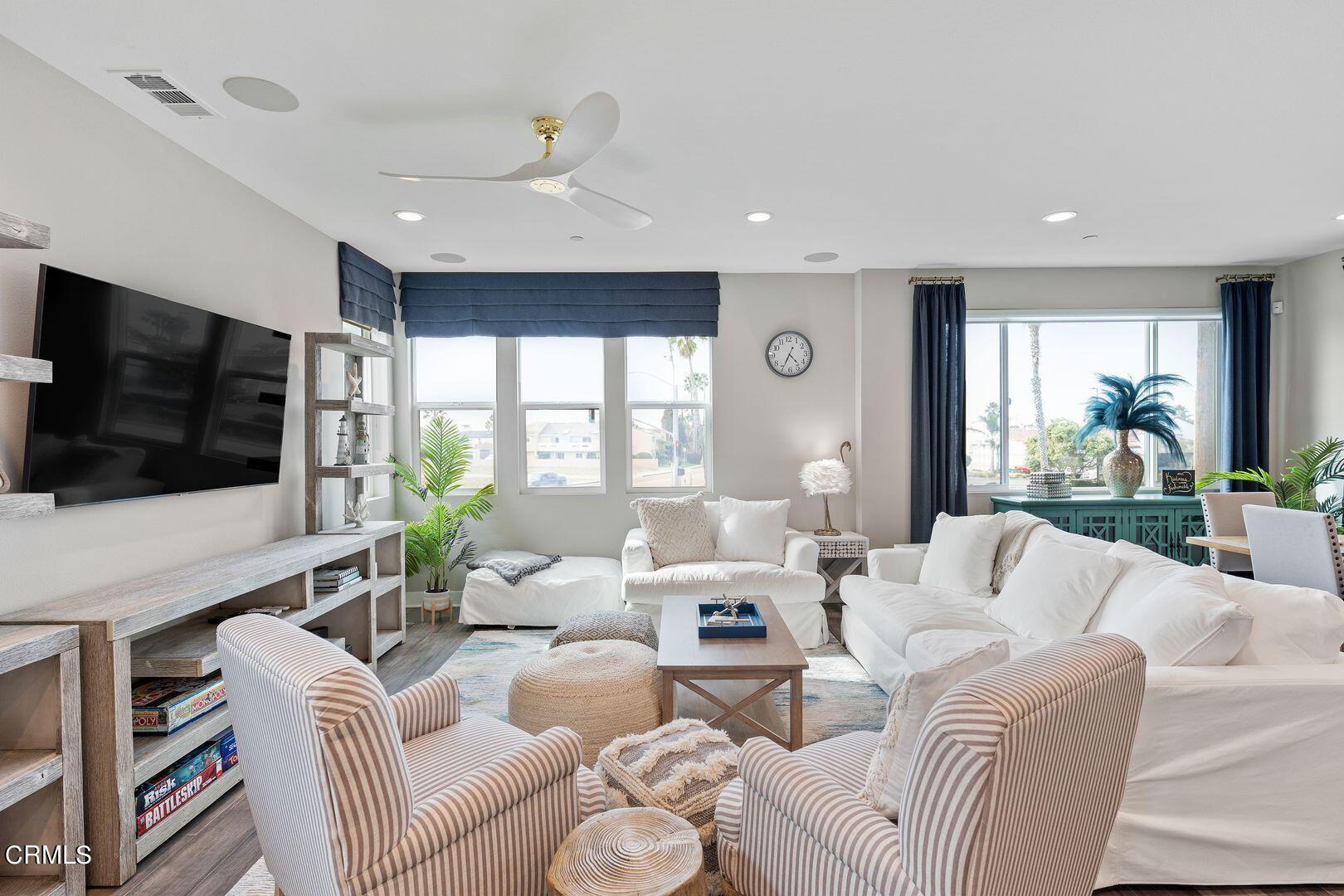 1028 Harbor Boulevard Oxnard, CA 93035 - Photo 17 of 48 a living room with furniture and a flat screen tv
