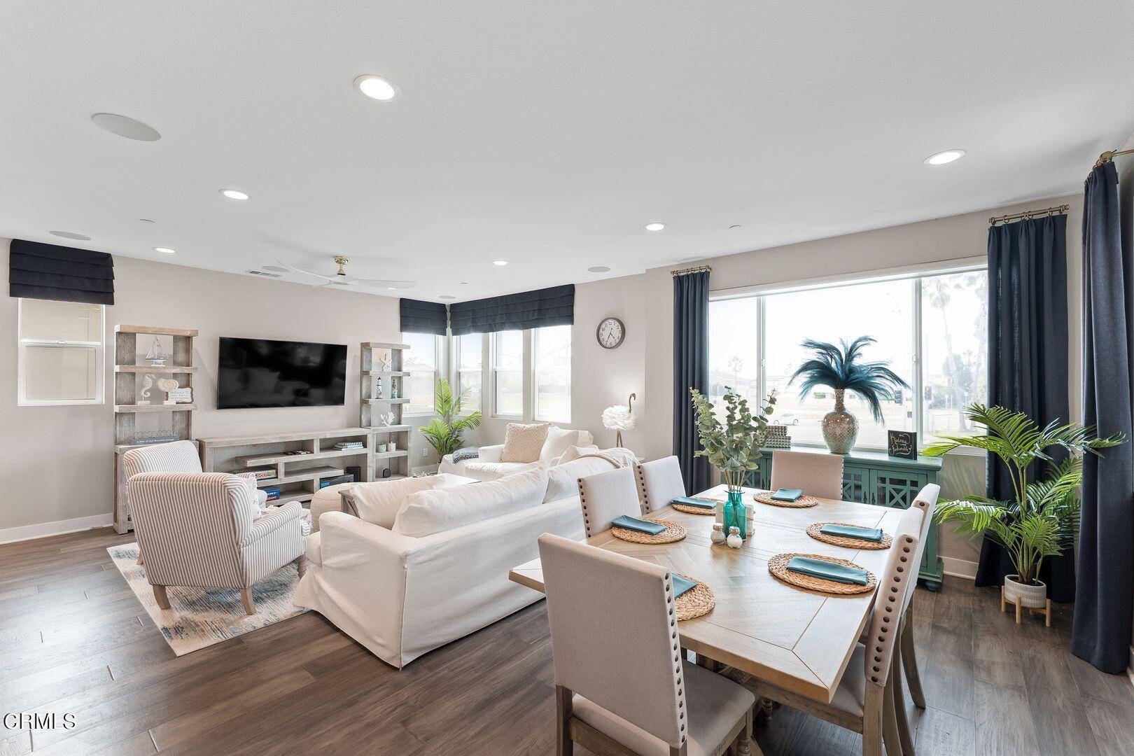 1028 Harbor Boulevard Oxnard, CA 93035 - Photo 21 of 48 a living room with fireplace furniture and a flat screen tv