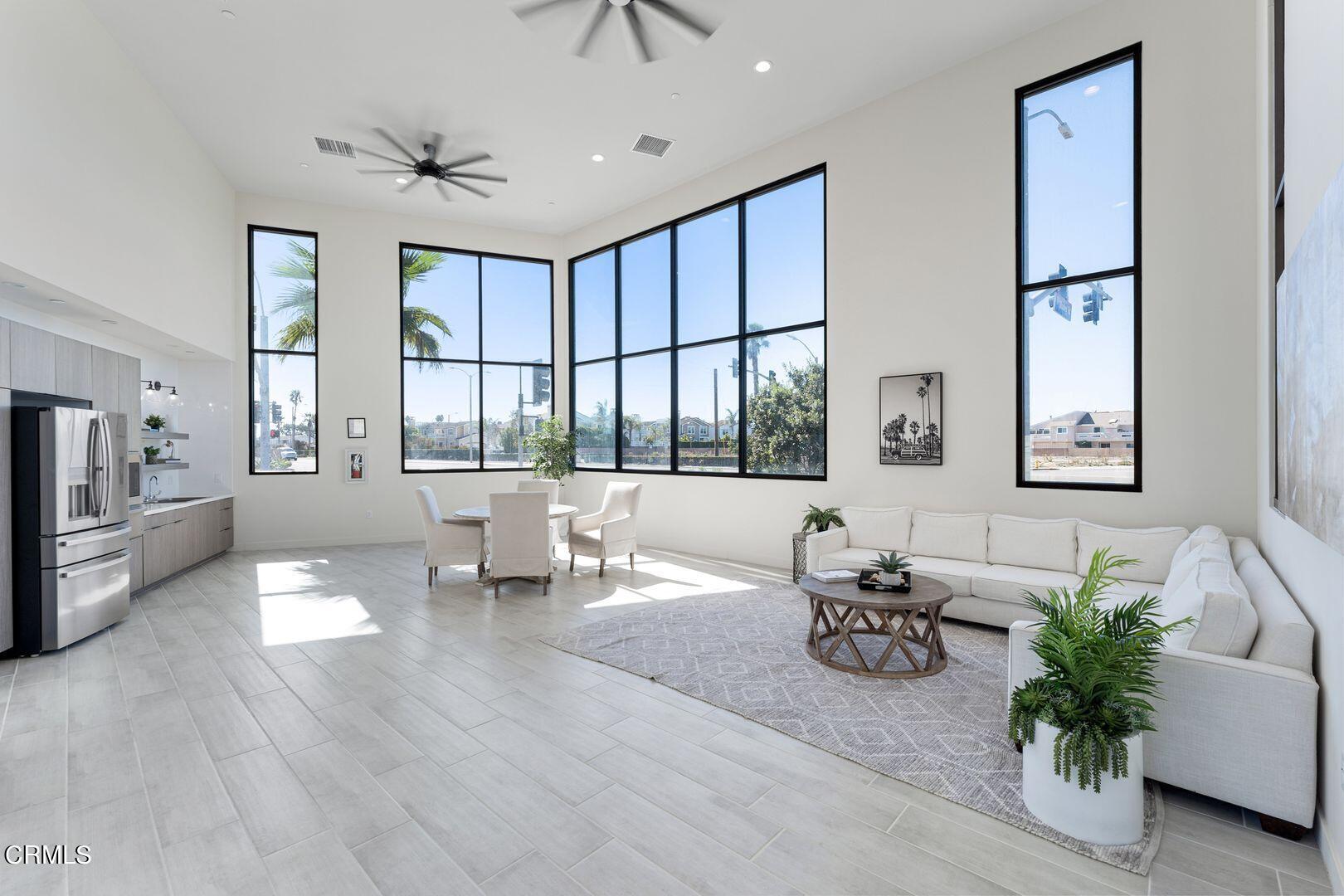 1028 Harbor Boulevard Oxnard, CA 93035 - Photo 47 of 48 a living room with furniture large window and potted plants