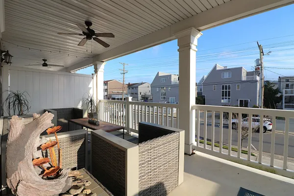 a view of a chairs and table in a patio