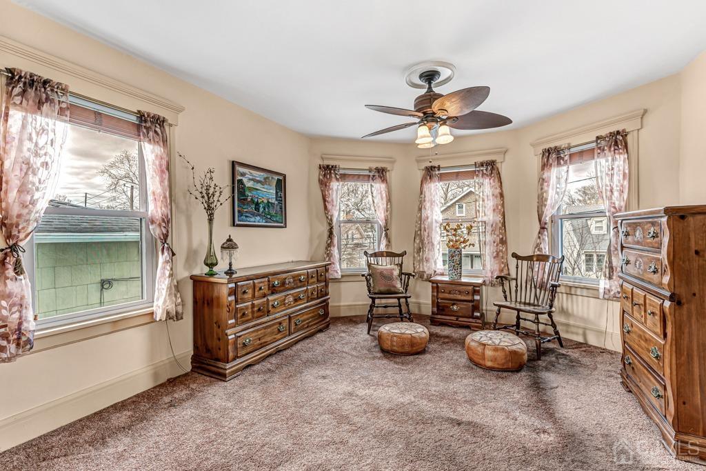 20 Codington Place Somerville, NJ 08876 - Photo 20 of 36 a view of livingroom with furniture and windows