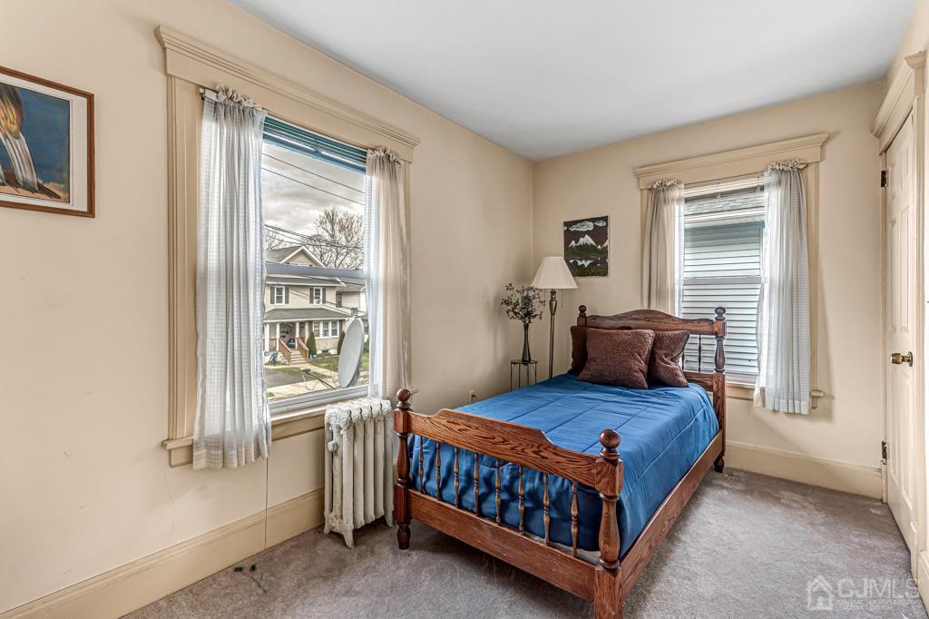 20 Codington Place Somerville, NJ 08876 - Photo 23 of 36 a bedroom with a bed and a window
