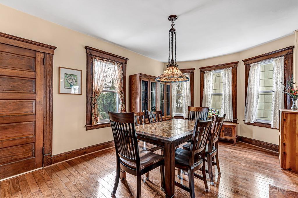 20 Codington Place Somerville, NJ 08876 - Photo 9 of 36 a view of a dining room with furniture window and wooden floor