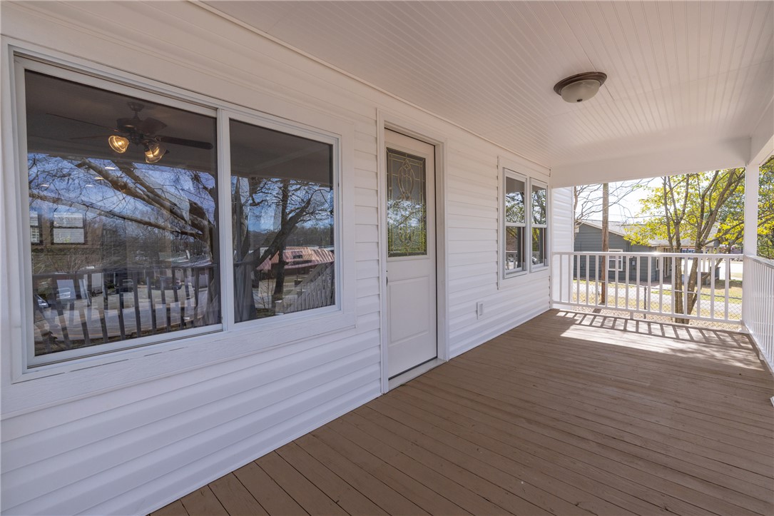 Welcome to a charming porch, perfect for enjoying quiet moments or social gatherings.