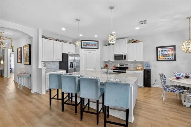 a view of a living room and hardwood floor