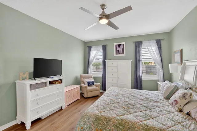 a view of walk in closet with clothes