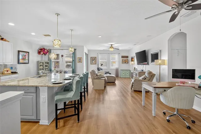 a very nice looking dining room with a table and chairs