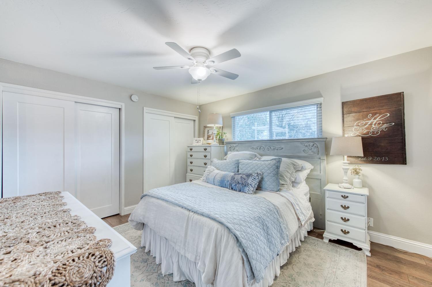 1880 East Cardella Street Firebaugh, CA 93622 - Photo 23 of 42 a bedroom with a bed and a television