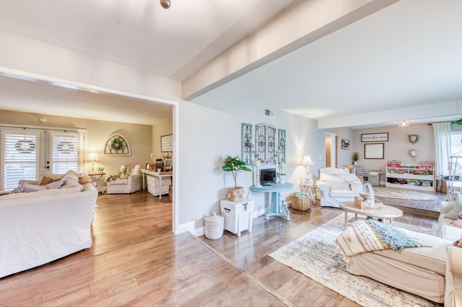 1880 East Cardella Street Firebaugh, CA 93622 - Photo 4 of 42 a living room with furniture and a couch
