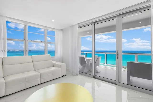a kitchen with granite countertop a sink and stainless steel appliances