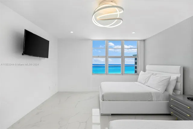 a living room with a flat screen tv