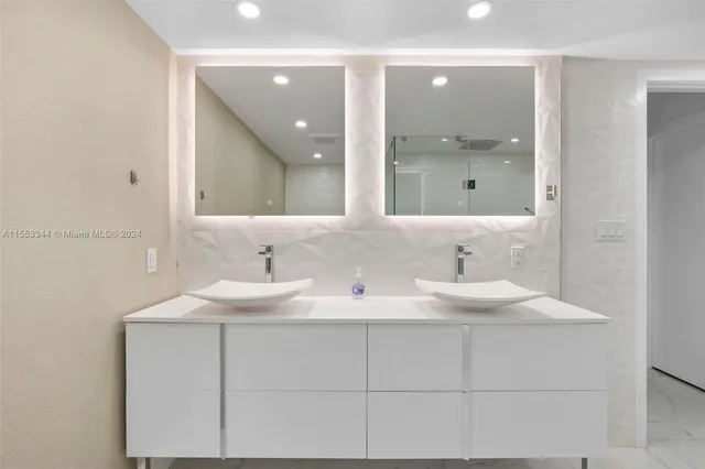 a view of a patio with a table and chairs